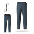 Men's loose quick-drying polyester sports trousers in navy blue, mid-waist with an American style cut for running and fitness