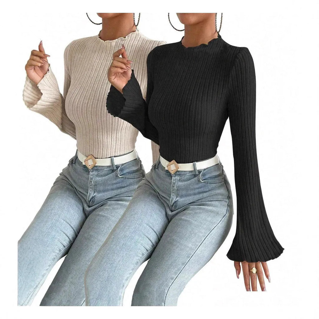 Black slim fit long sleeve top with lantern sleeves and a round neckline on a mannequin.