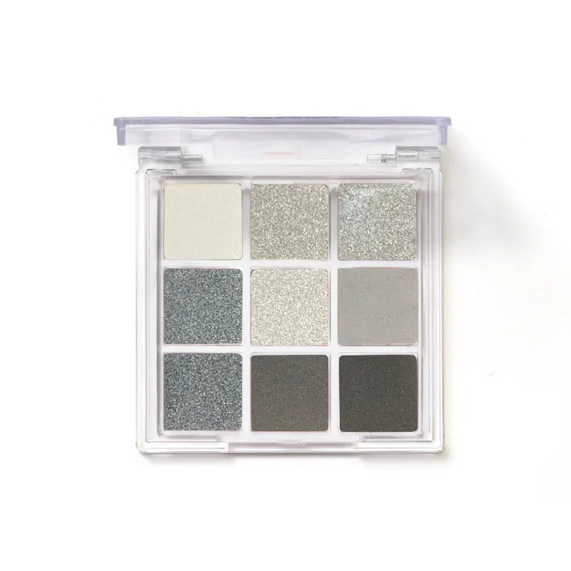 Nine-colour smoked theme eyeshadow palette showing white, silver, black, and iron grey shades