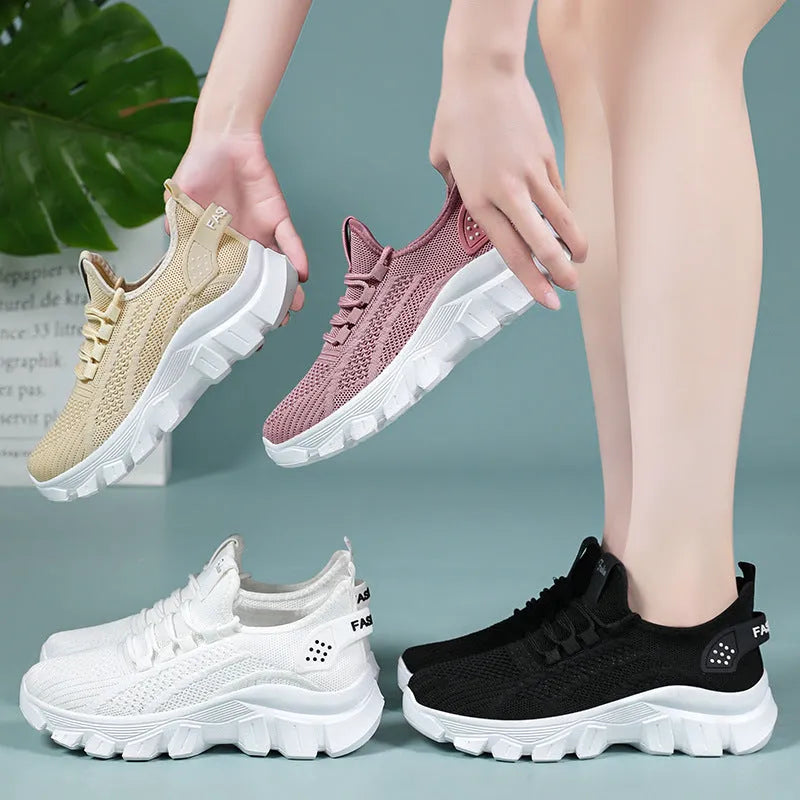 Men's white Flyknit running sneakers with thick PVC sole and lace-up closure