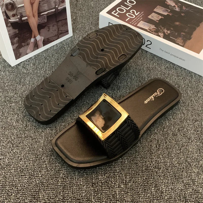 Women's casual flat slippers in apricot, black and khaki with a textured PVC sole.
