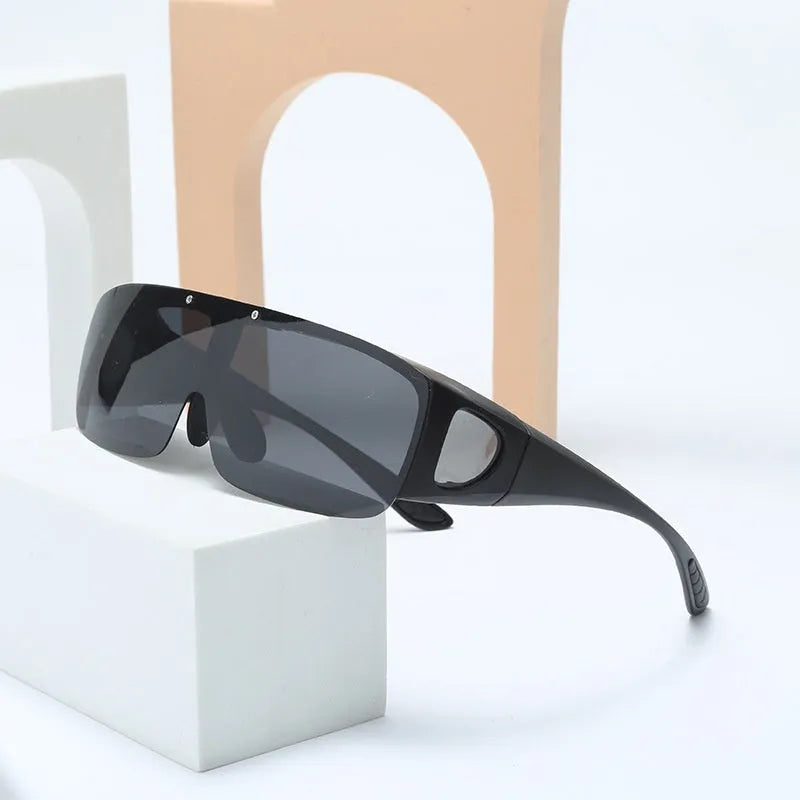 Polarised sunglasses with myopia correction for outdoor sports like climbing and cycling with interchangeable lenses