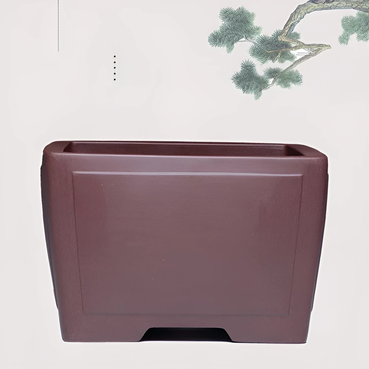 Square purple clay succulent bonsai pot in classical style on a wooden table.