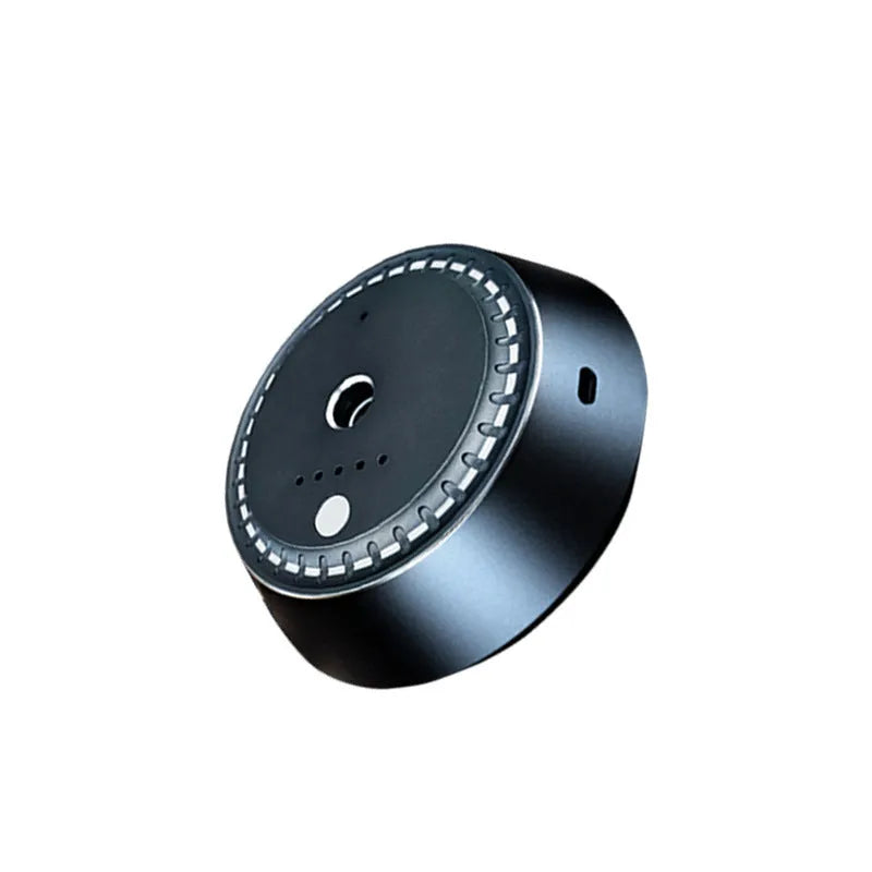 Black metal car aroma diffuser measuring 9cm by 4.5cm with USB connection