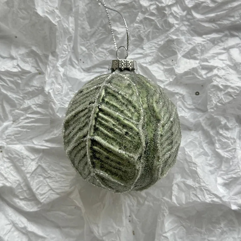 Handmade glass Christmas ball pendant ornament, 8cm diameter, green color, on tree branch