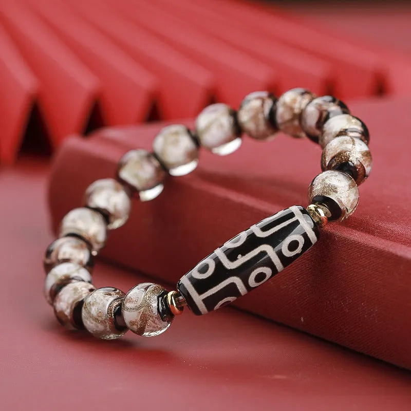 Chinese-style coloured glaze bracelet with five-colour snake lucky beads and auspicious patterns.