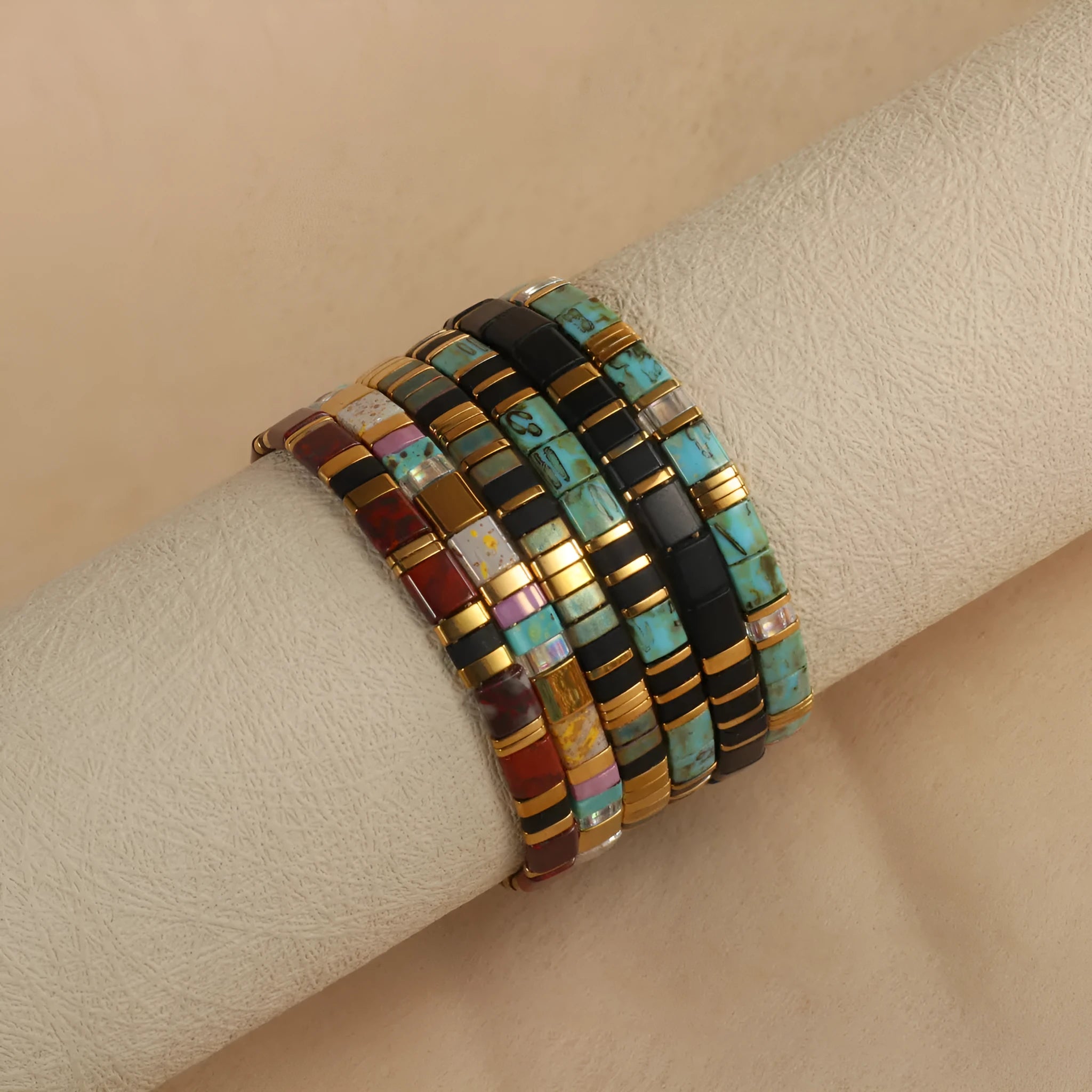 Adjustable glass beaded bracelet in geometric design with round beads available in five colours