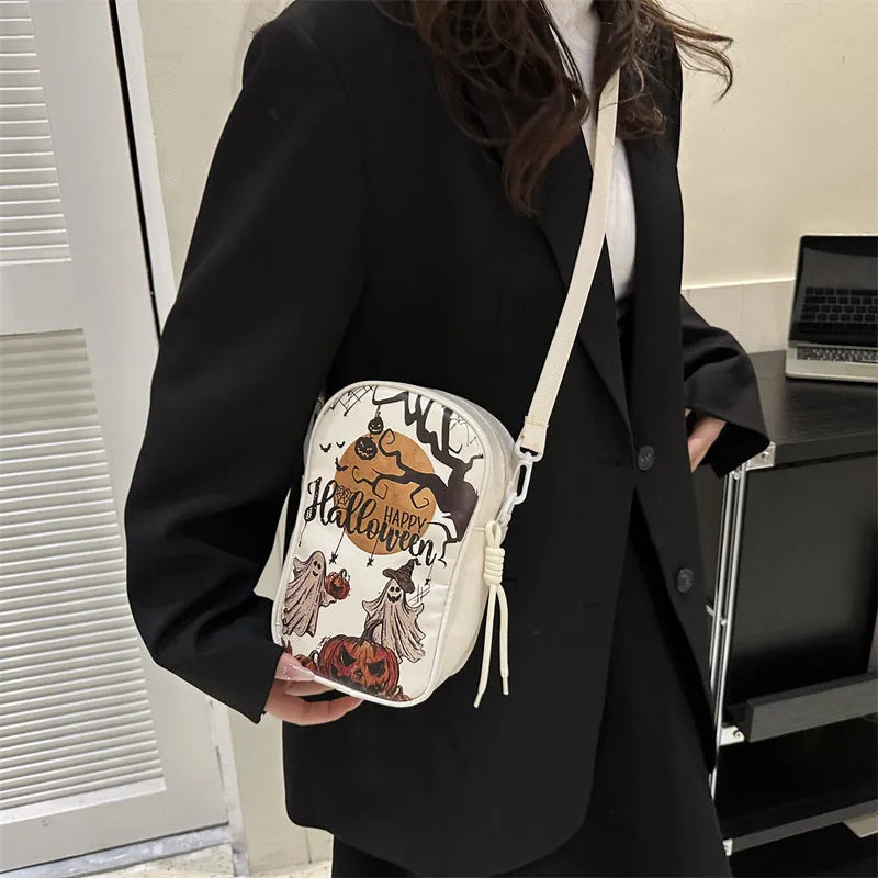 Halloween graffiti print crossbody phone bag with cartoon pumpkin ghost bat designs