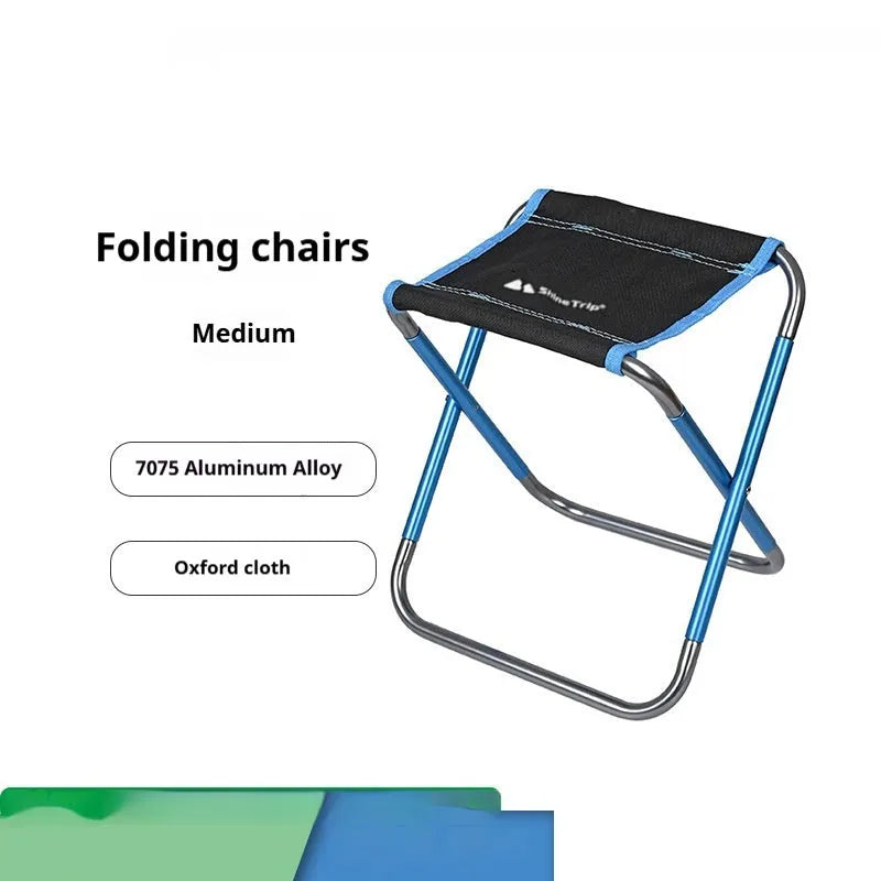 Black ethnic style folding camping stool with aluminium alloy frame, shown in folded and open positions.