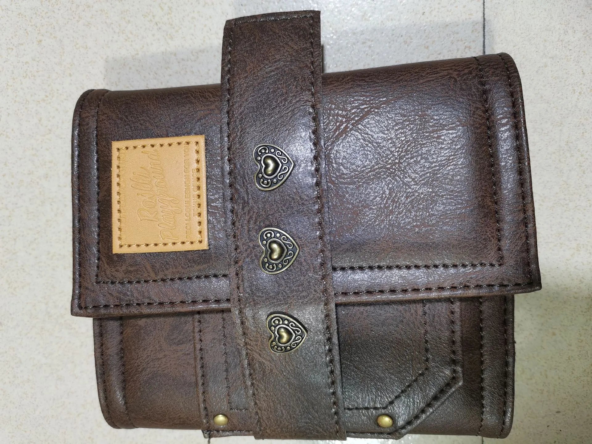 A7 brown PU leather buckle notebook with loose-leaf binding and 40g paper