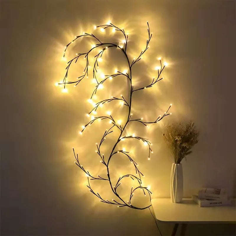 Flexible Christmas vine garland with warm white LED lights and birch bark texture bent into decorative shape