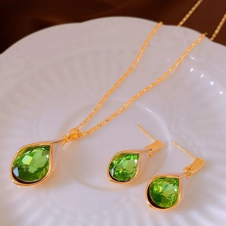 Real gold electroplated water drop-shaped earrings with inlaid zircon and crystal pendant