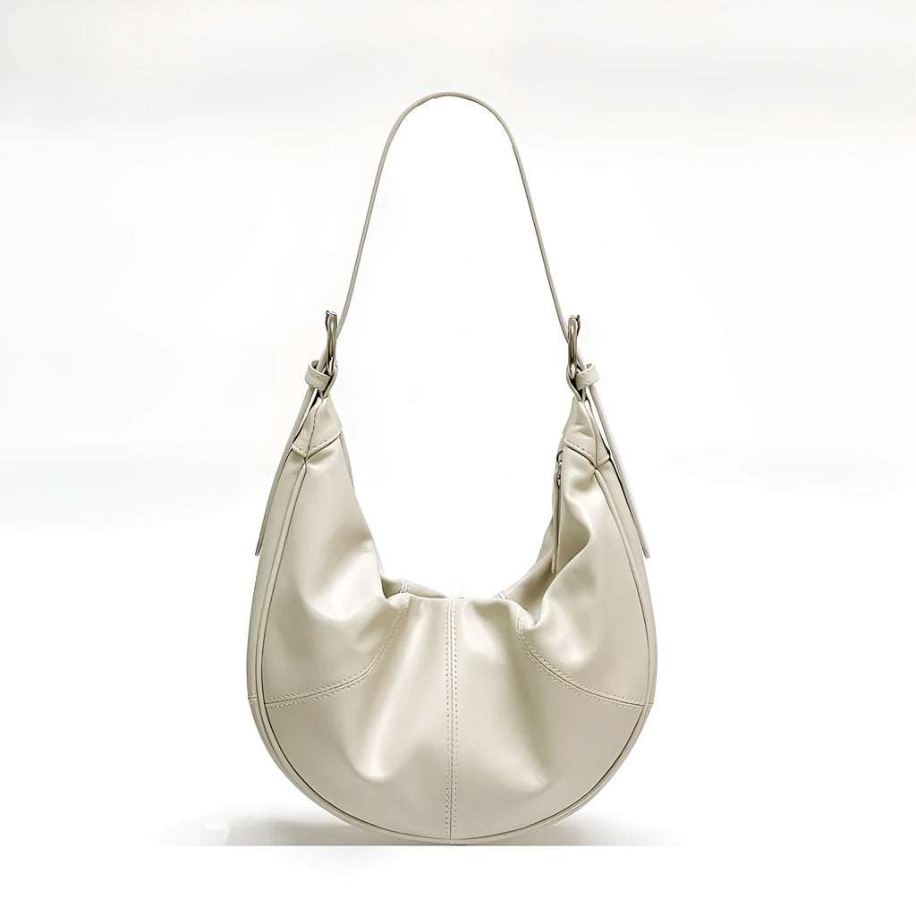 Women's dumpling-shaped shoulder bag in genuine cowhide leather with sandwich pockets