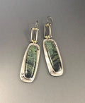 Two-colour marble pattern geometric alloy earrings showing geometric shape and two-tone surface design