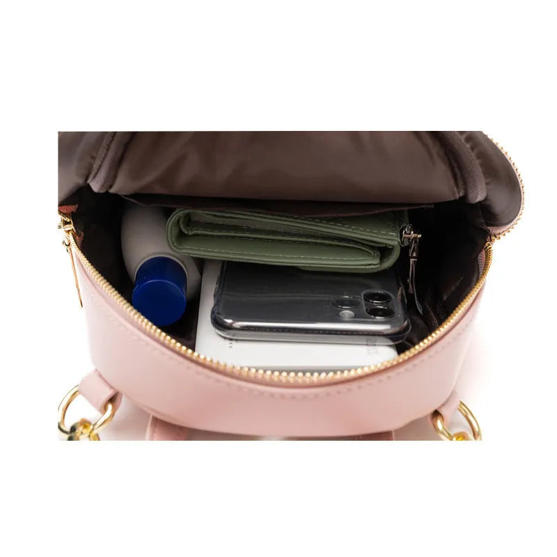 Soft PU mini backpack with three-dimensional pockets in street trend style showing contrast colour details