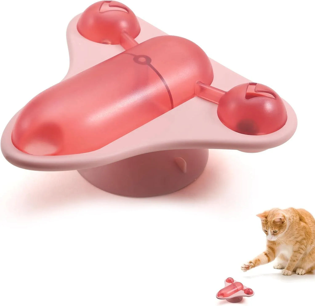 Blue interactive pet puzzle toy with bell, catnip spot, and airplane snack cabin on a smooth floor.
