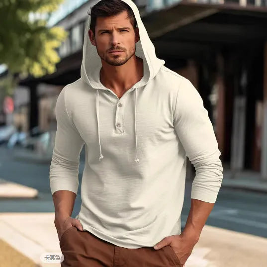 Man wearing a dark blue cotton pullover hoodie top with long sleeves, showing loose casual fit.
