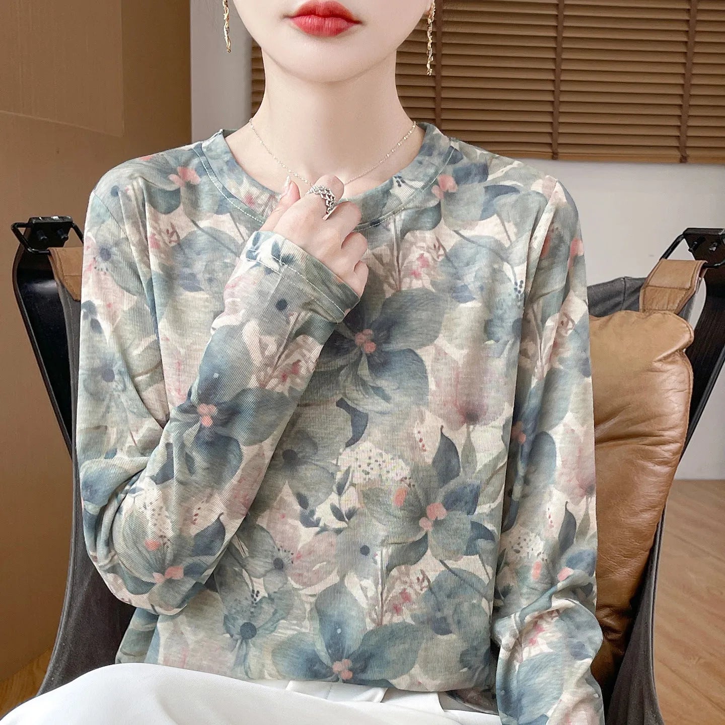 Women's round neck pullover shirt in Tencel cotton with a yellow roses floral print design.