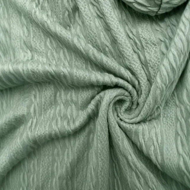 Green loose-fit women's hooded sweater coat with a front zipper and long sleeves on a hanger.