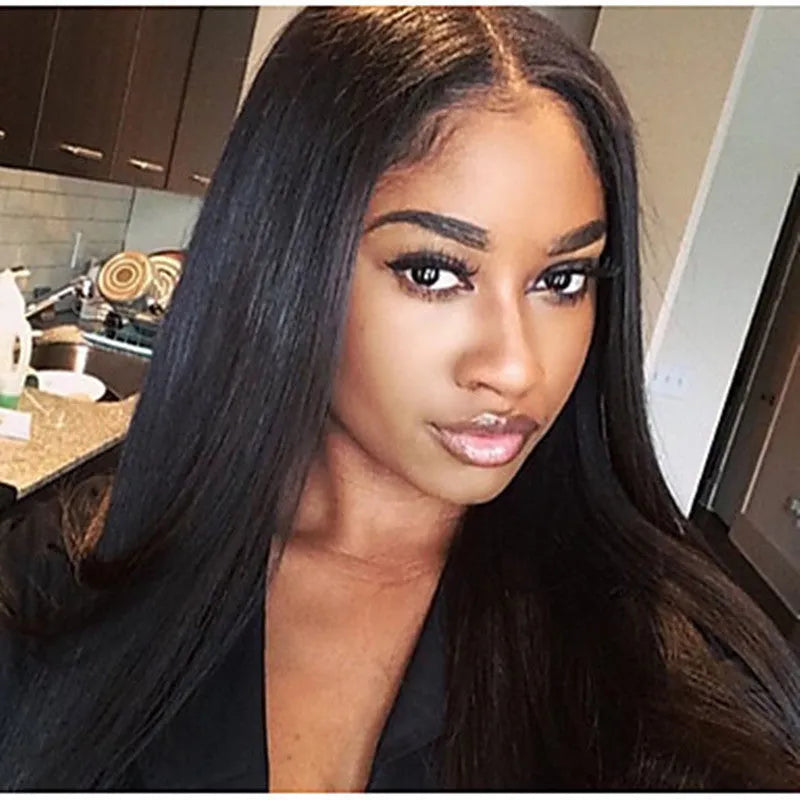 Long black straight hair wig with centre-parted bangs on a model