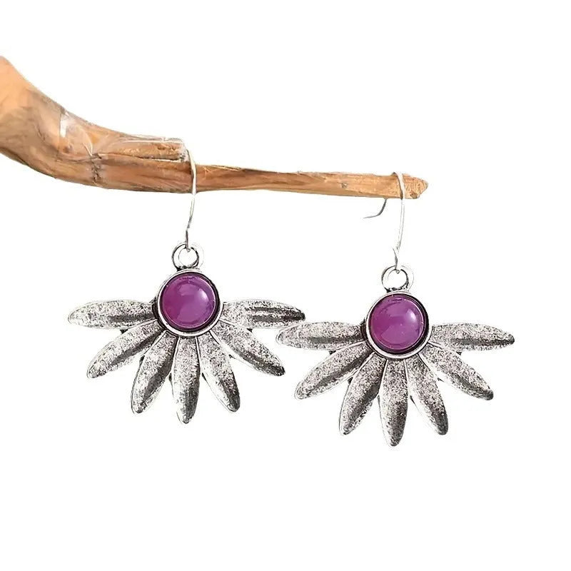 Purple Bohemian earrings with resin flowers and animal zodiac designs on alloy base