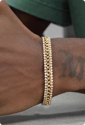 Gold colour tennis bracelet with artificial gemstone inlay on titanium steel band