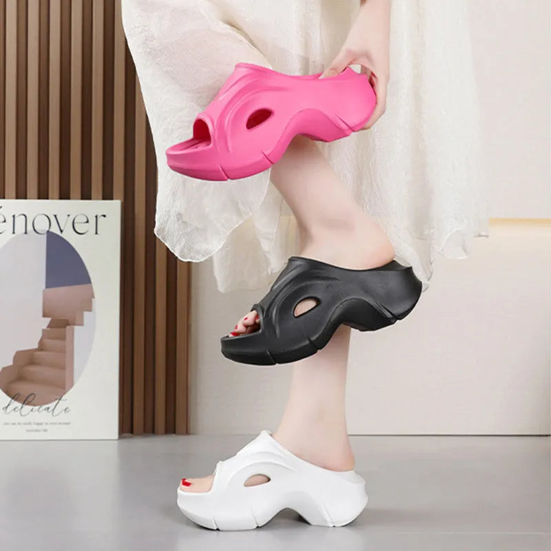 Women's EVA thick-soled slippers in white, black, and rose red colours with round toe design
