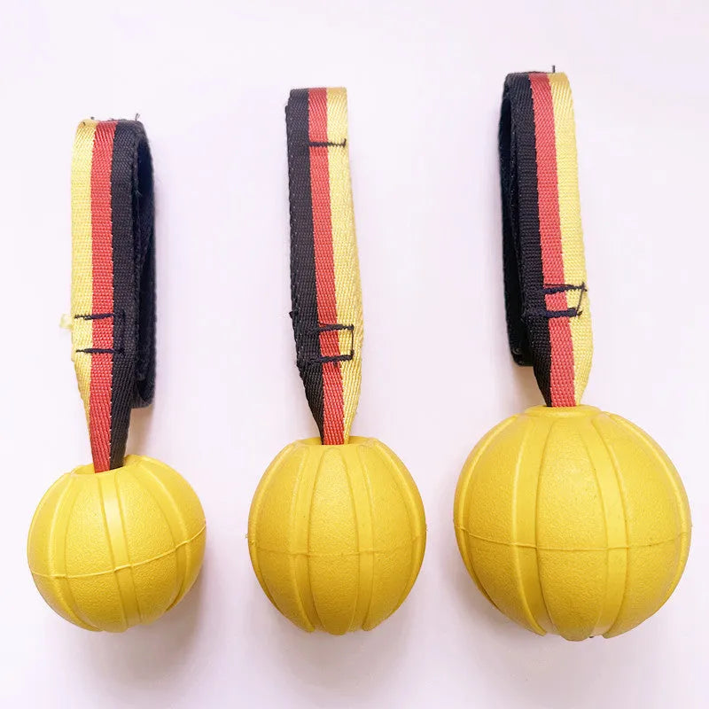 Yellow and camouflage EVA foam floating tetherball dog toys in 6.5cm, 7cm, and 9cm sizes.
