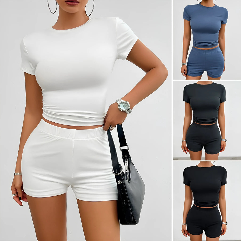 Women's solid colour slim fit viscose sports set with t-shirt and elastic shorts.