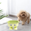 Green robot elevated cat bowl with tilted design and anti-slip base for pet feeding