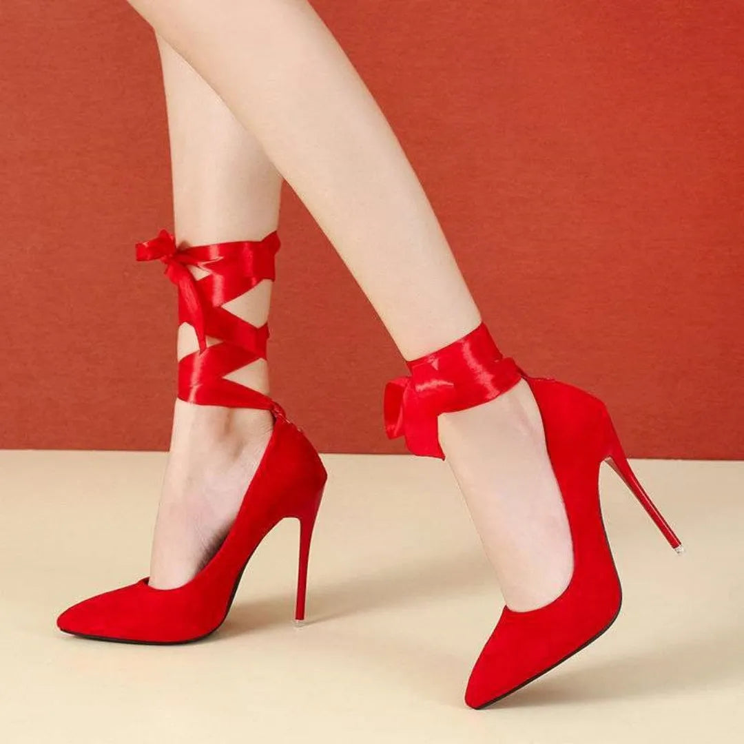 Women's black pointed toe stiletto shoes with strap fastening detail