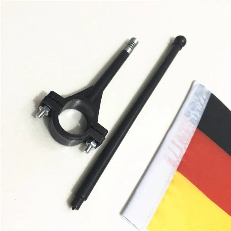 Cycling handlebar flagpole with small polyester square flag attached to bicycle for promotional use