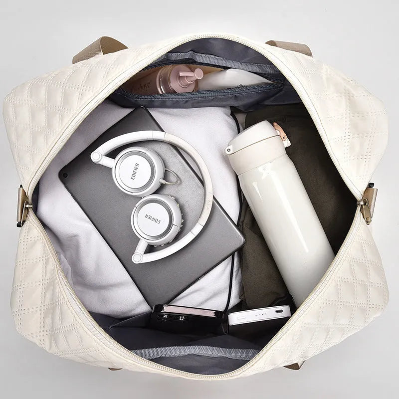 Oxford cloth leisure travel bag in a solid colour with a 36-55 litre capacity.
