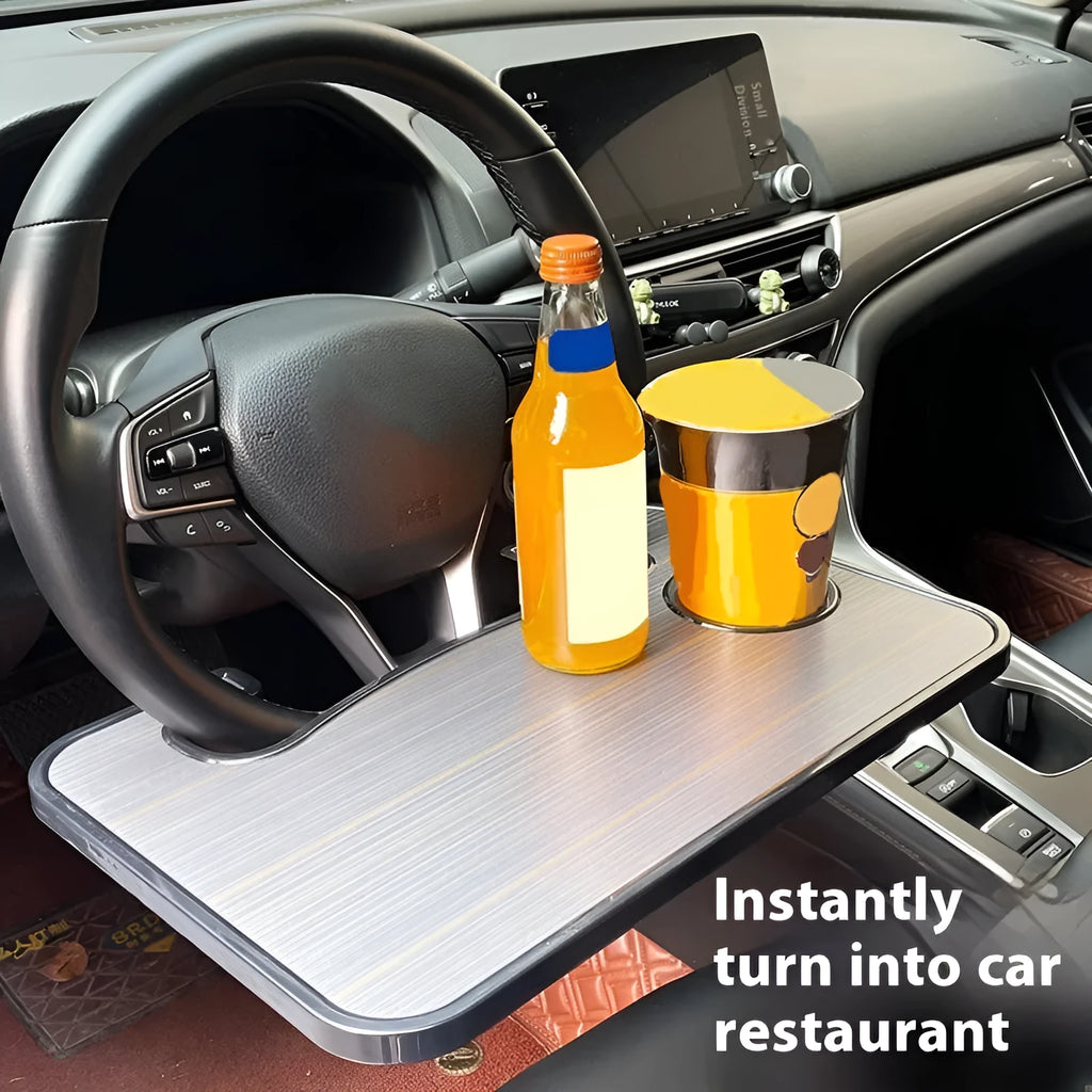 Black ABS car steering wheel tray holding a laptop, with a foldable drink cup holder attached.