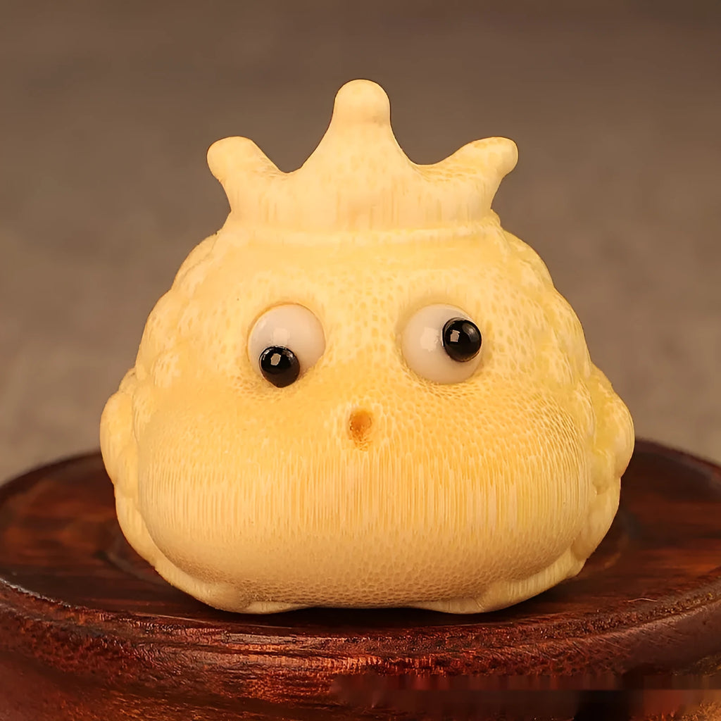 Solid bamboo carving of a cute Crown Princess Toad ornament with detailed live eyes.