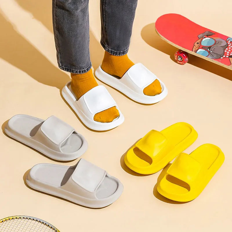 EVA flip-flop slippers with thick sole in assorted colours on a white background.