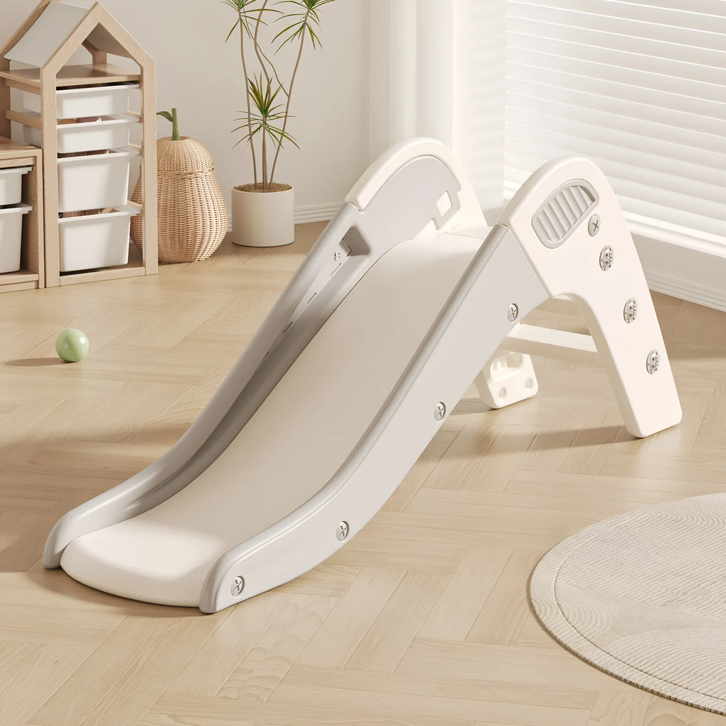 Small blue plastic baby slide for indoor play and early development.