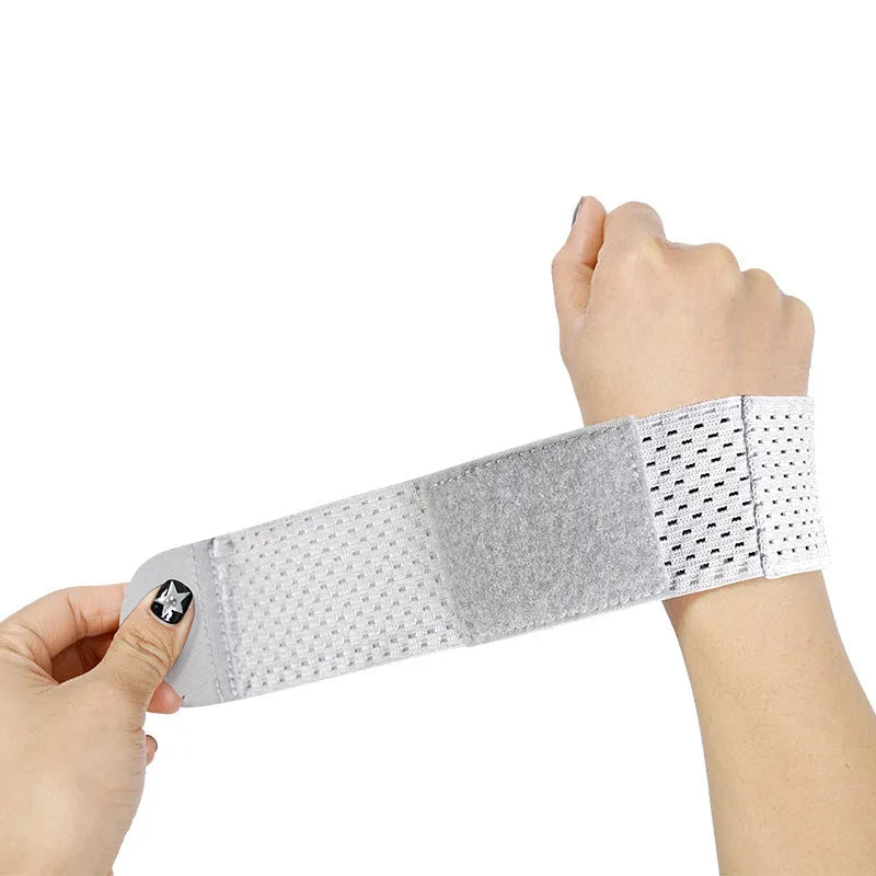 A black elastic breathable wristguard with an adjustable strap, designed for gym and weightlifting.