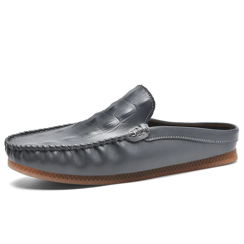 Men's black breathable semi-slippers with a rubber sole and artificial PU upper on a plain background.