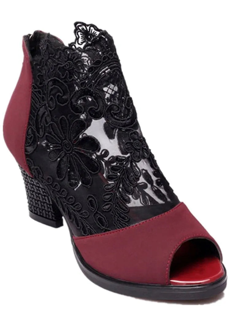 Black lace gladiator sandals with square high heel, peep toe and front zip closure