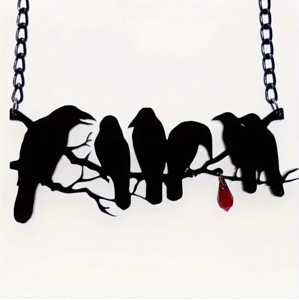 Black crow necklace with bird zodiac pendant on cross chain for women's alternative fashion jewellery