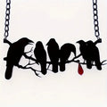 Black crow necklace with bird zodiac pendant on cross chain for women's alternative fashion jewellery
