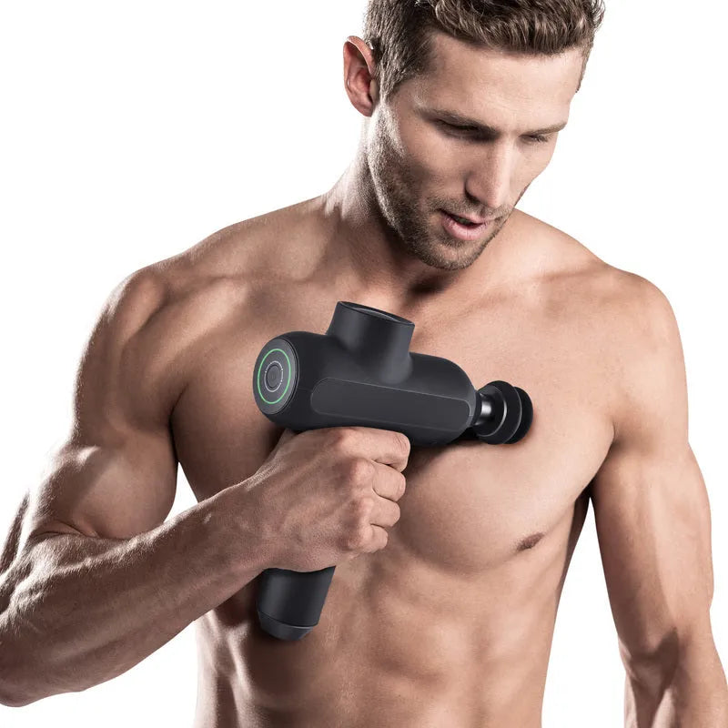 Handheld electric muscle relaxation massager with six different coloured massage heads on a black background.