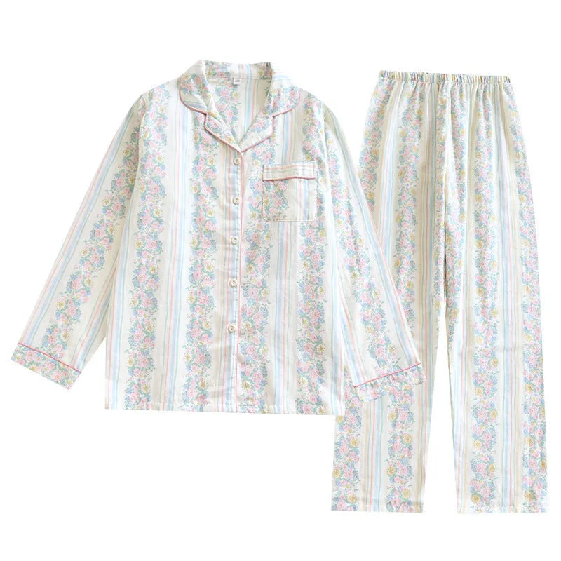 Women's cotton gauze pyjama set with long sleeves and trousers in a colour stripes or fruit print pattern.
