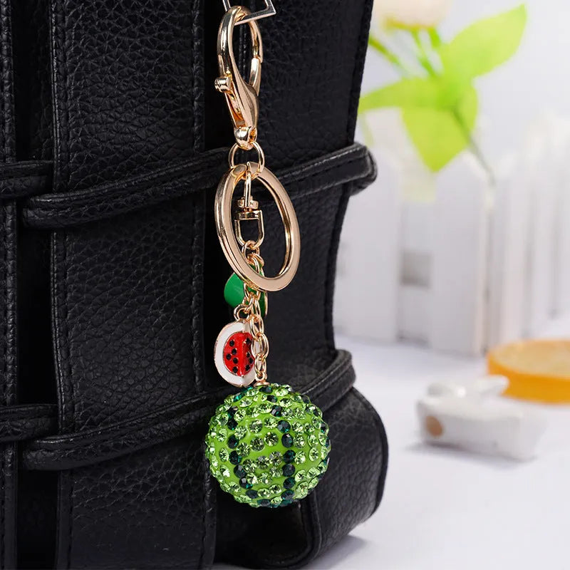 Green watermelon fruit keychain made from zinc alloy measuring 12 cm in length
