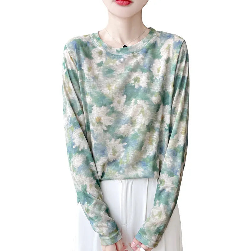 Women's round neck pullover shirt in Tencel cotton with a yellow roses floral print design.