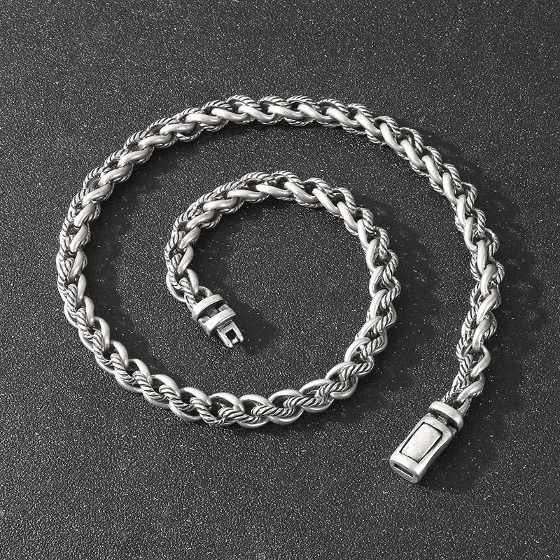Men's titanium steel keel chain necklace showing vintage design with large hemp flower elements in antique silver finish