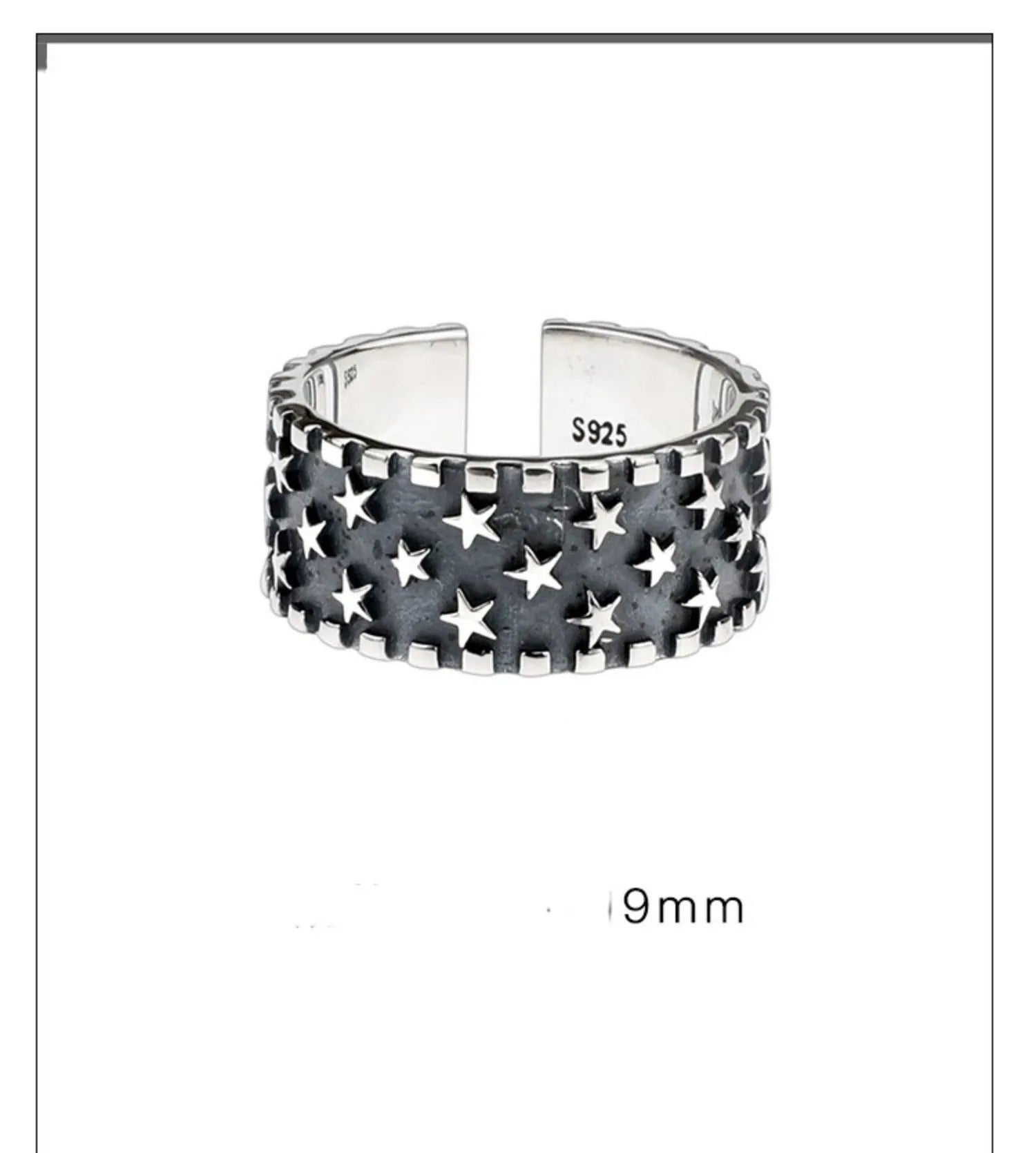 Adjustable opening sterling silver ring with a geometric pattern of several five-pointed stars.