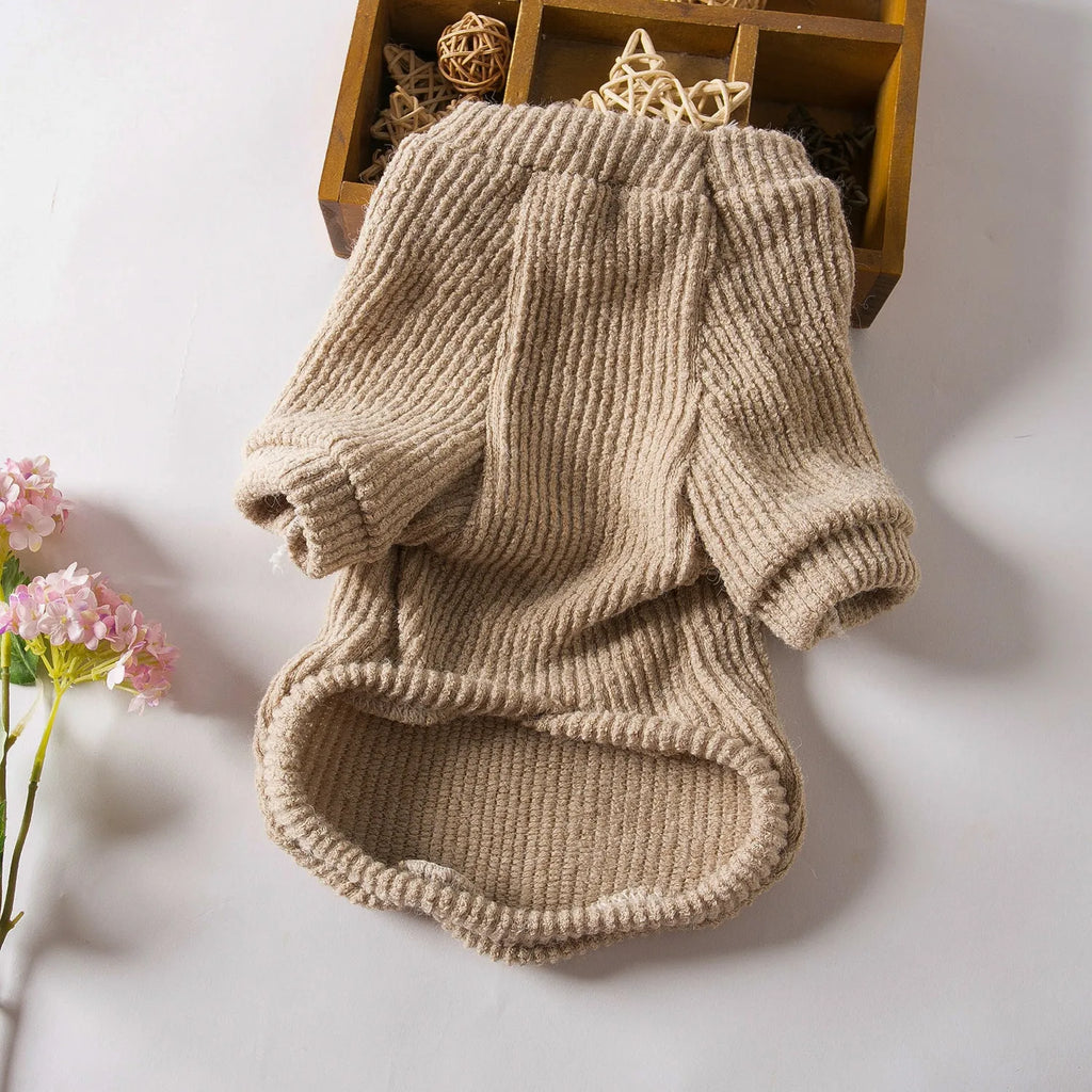 Brown cloth dog sweater pullover for small breeds on size chart showing XS to XL