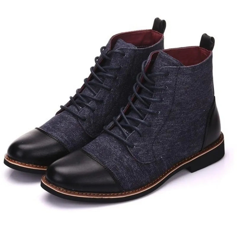 Men's large black leather motorcycle boots with belt buckle detail and a thick rubber sole.